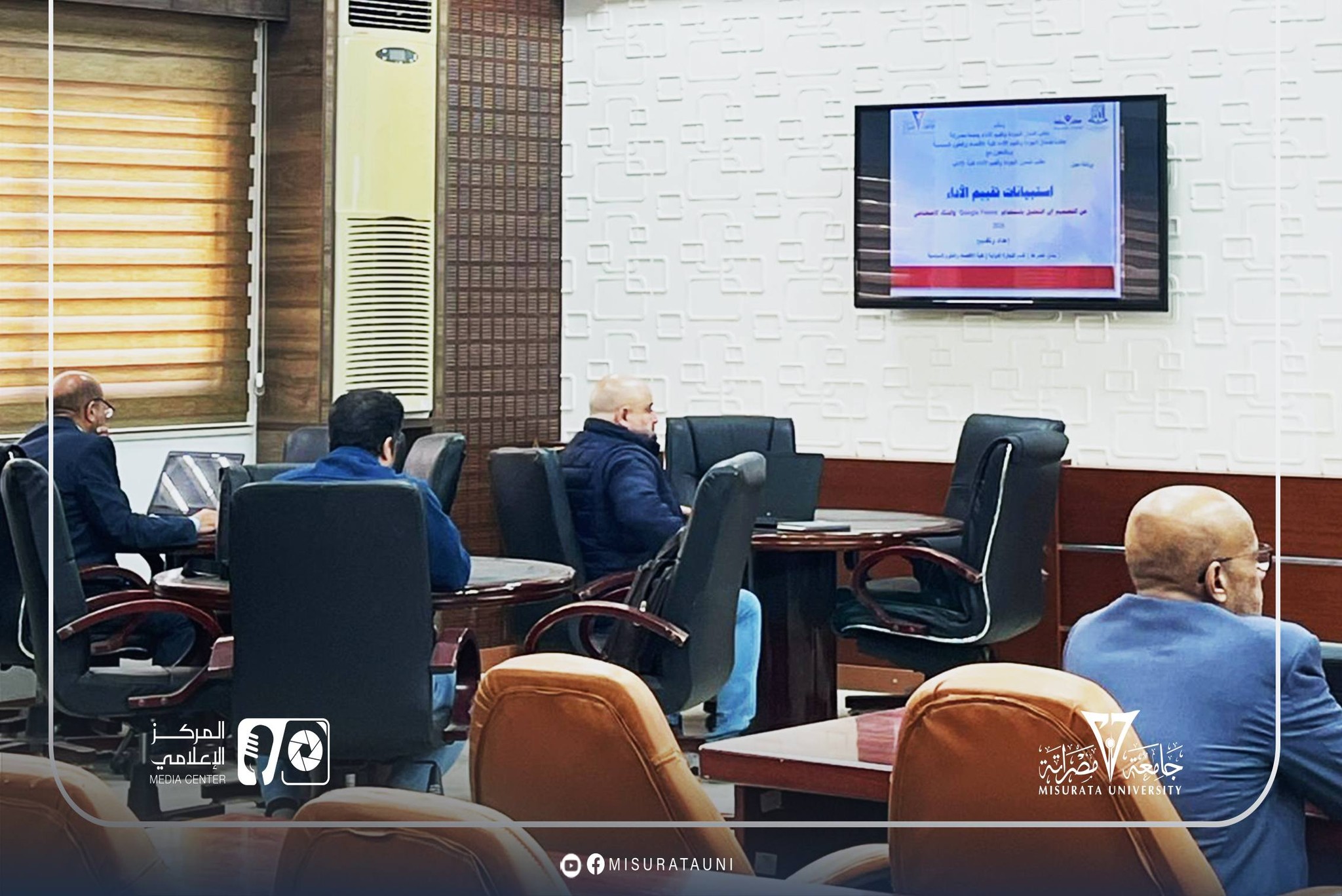 A specialized workshop at Misrata University on employing artificial intelligence in analyzing evaluation data.
                     width=